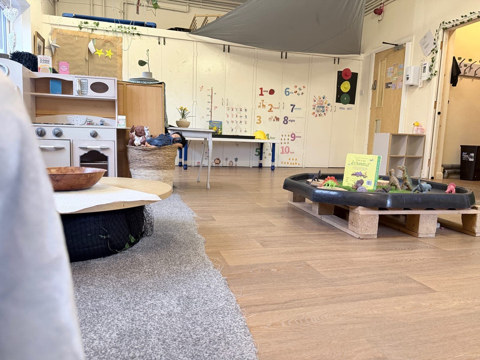 Staff working with children at Busy Bugs Nursery